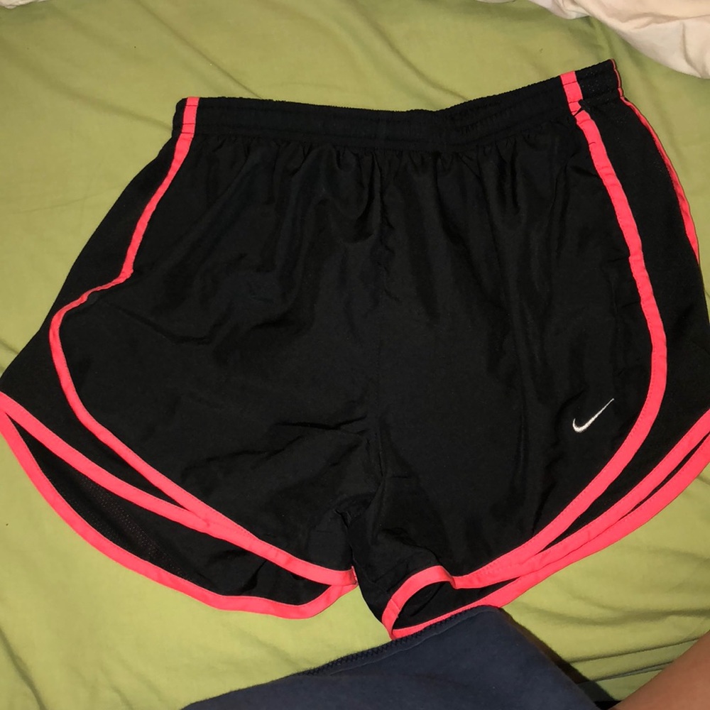 Black and bright pink nike shorts